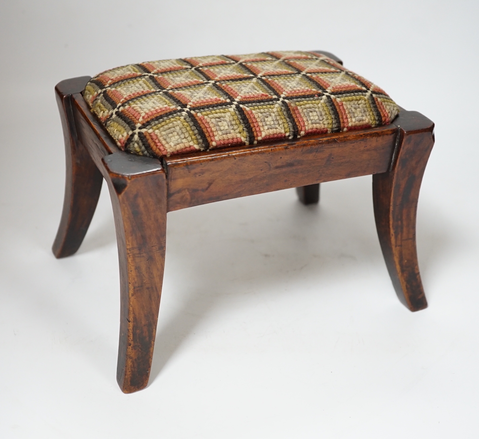 A 19th century walnut lacemaker's stool, 24cm wide